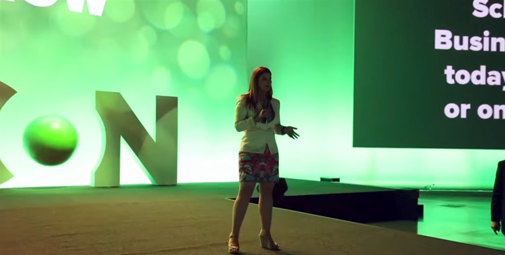 Lisa Macqueen speaking on stage